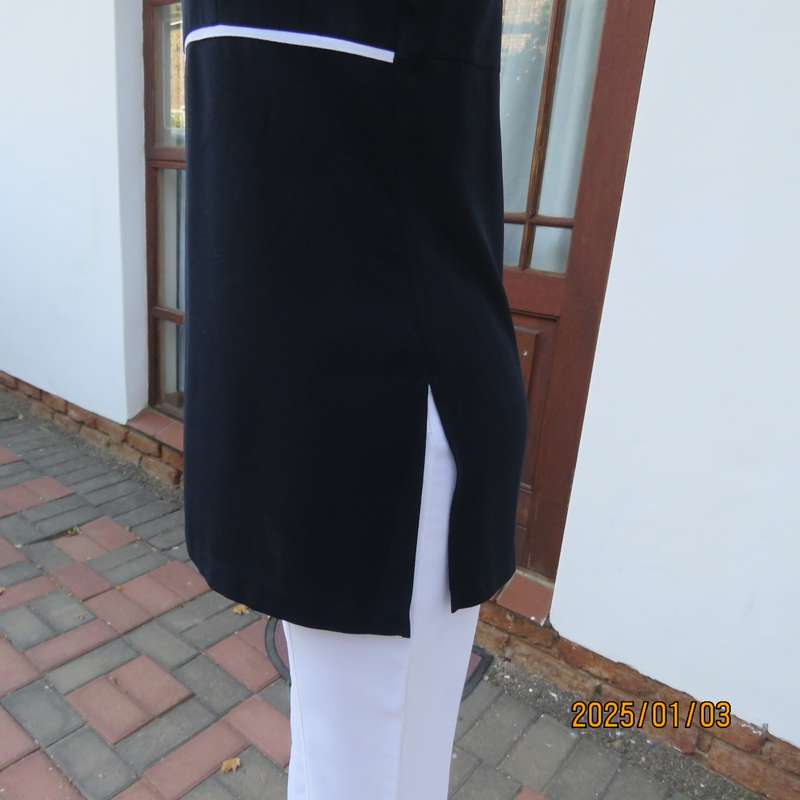 Elegant dark navy empire style sleeveless TRUWORTHS long top. White edging. Back zip, Size 34.As new