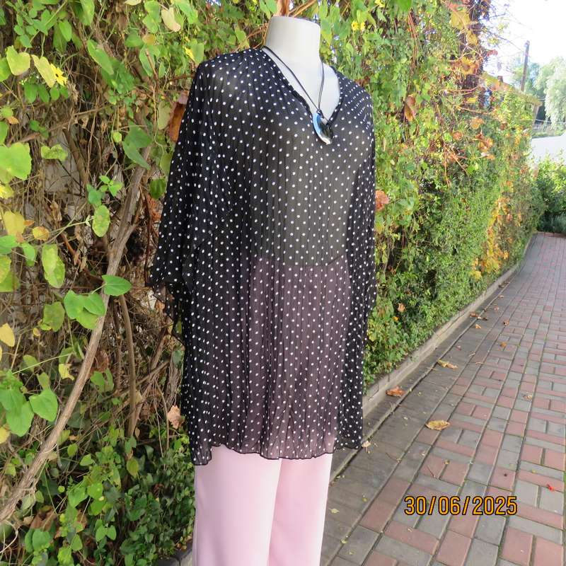 DONNA CLAIRE sheer black-white polkadot pleated top. Size 48. Open elbow sleeves.