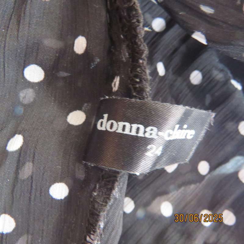 DONNA CLAIRE sheer black-white polkadot pleated top. Size 48. Open elbow sleeves.