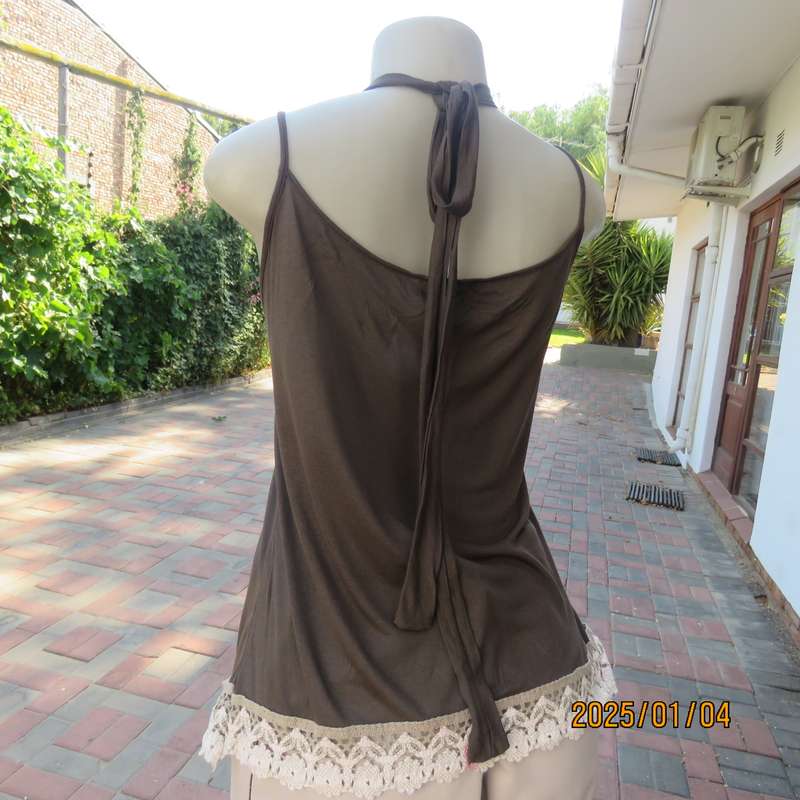 RED MOON uniquely styled brown strappy-halter neck top. Cream cotton frill all around. Size 38-40.
