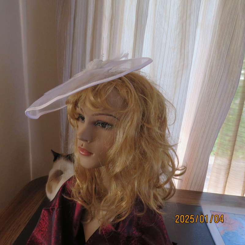 Beautiful styled light cream round mesh fascinator with flower-feathers and beads. Thin satin band,