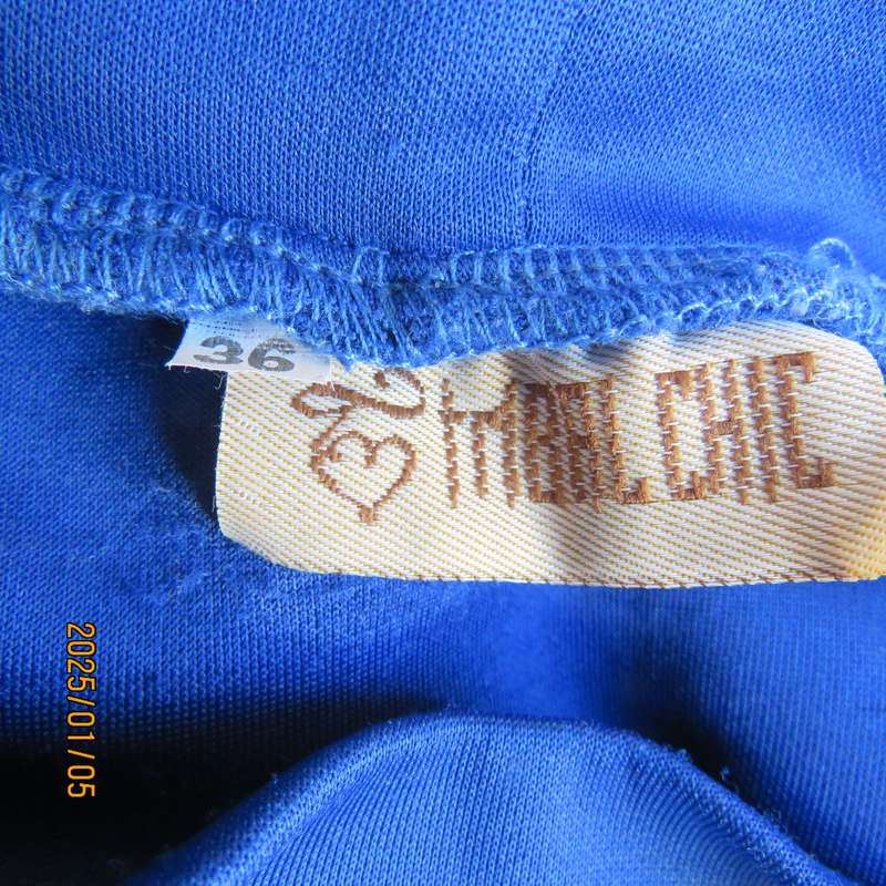 TRIBAL CHIC royal blue slip over size 36 stretch polyester dress. Right shoulder with pleated frill