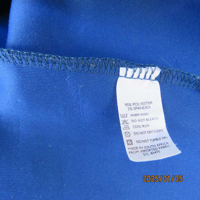 TRIBAL CHIC royal blue slip over size 36 stretch polyester dress. Right shoulder with pleated frill