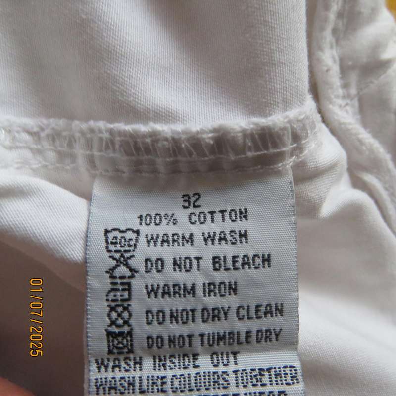 White men's knee length 100% cotton shorts with drawstring. Size 34