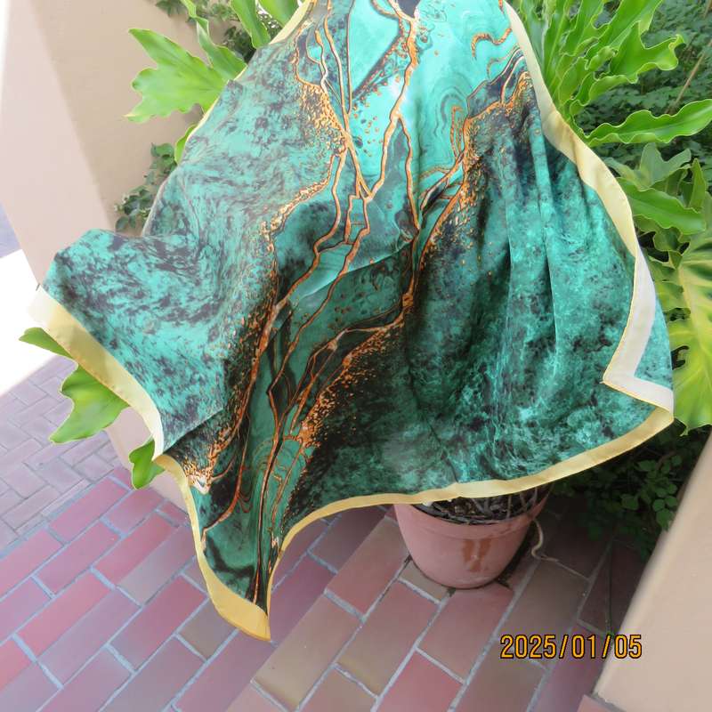 Soft polyester square 67cmx67cm scarf marble patterned in greens with gold colour edges and designs.
