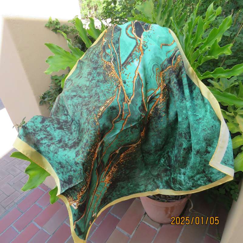 Soft polyester square 67cmx67cm scarf marble patterned in greens with gold colour edges and designs.