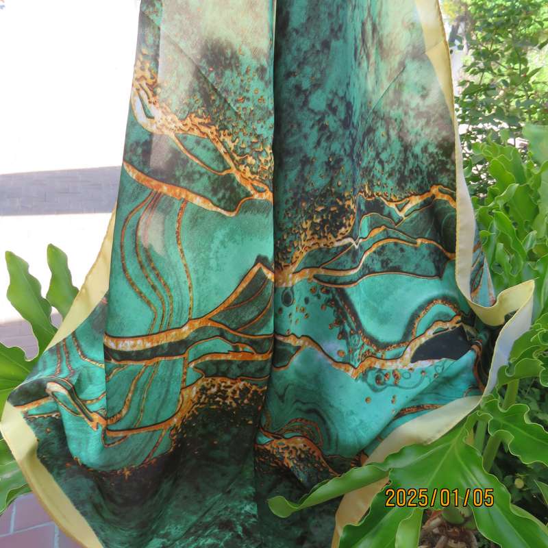 Soft polyester square 67cmx67cm scarf marble patterned in greens with gold colour edges and designs.