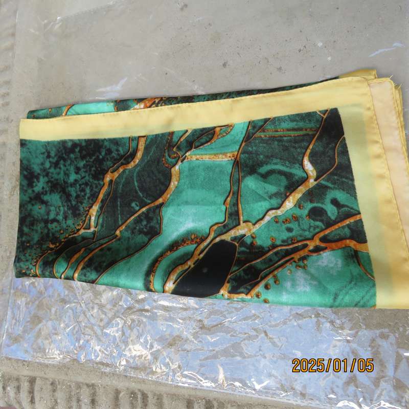 Soft polyester square 67cmx67cm scarf marble patterned in greens with gold colour edges and designs.