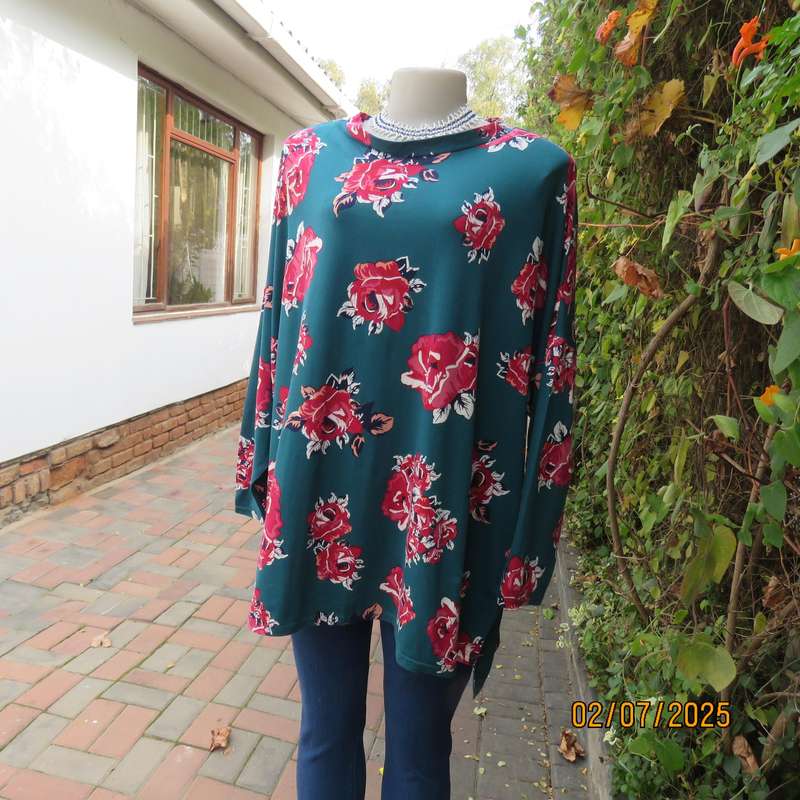 Dark jade slip over stretch polyester top with red-white flowers. Long sleeves. Size 50