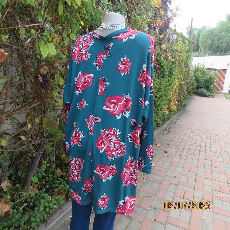 Dark jade slip over stretch polyester top with red-white flowers. Long sleeves. Size 50
