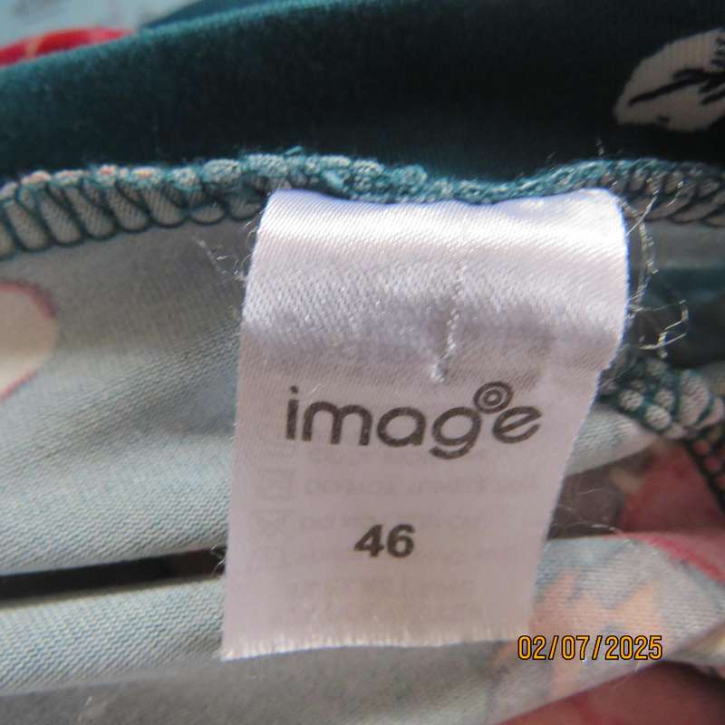 Dark jade slip over stretch polyester top with red-white flowers. Long sleeves. Size 50