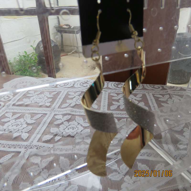 Pair curled light weight golden long earrings with silver glitter. 8cm long. New item