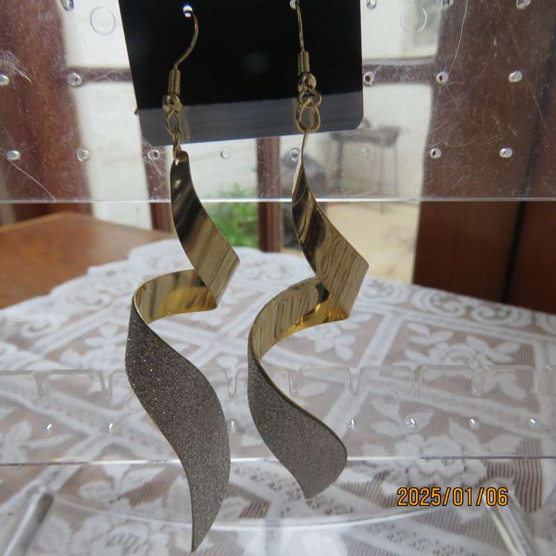 Pair curled light weight golden long earrings with silver glitter. 8cm long. New item