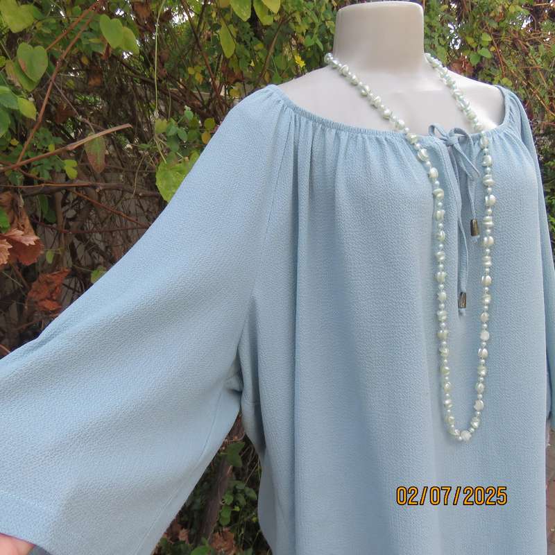 DONNA CLAIRE pale jade slip over textured polyester top. Wide elasticated neckline. Size 50