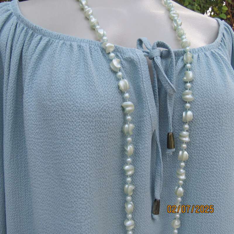 DONNA CLAIRE pale jade slip over textured polyester top. Wide elasticated neckline. Size 50
