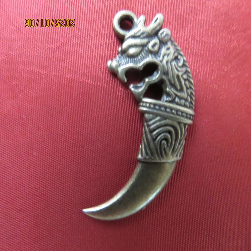 Men's brass pendant in tooth design. Length 4.2cm. Just need suitable chain. New item.