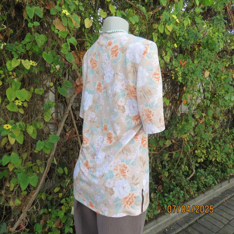 WOOLWORTHS oatmeal colour V front button down top. With peach-lilac flowers. Size 34