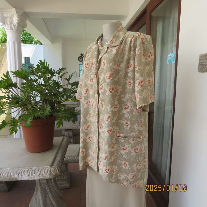 Fabulous boutique made tea green-white-rust floral pattern short sleeve jacket.Size 40-42. As new.