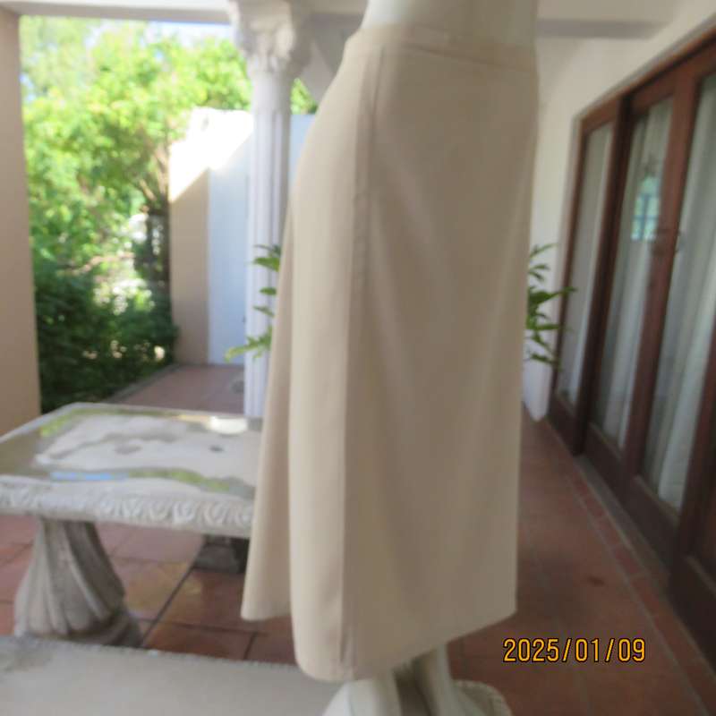 FERGIE oatmeal colour pencil skirt size 50-52. Flat front.Elasticated waist back. Front tucked seam.
