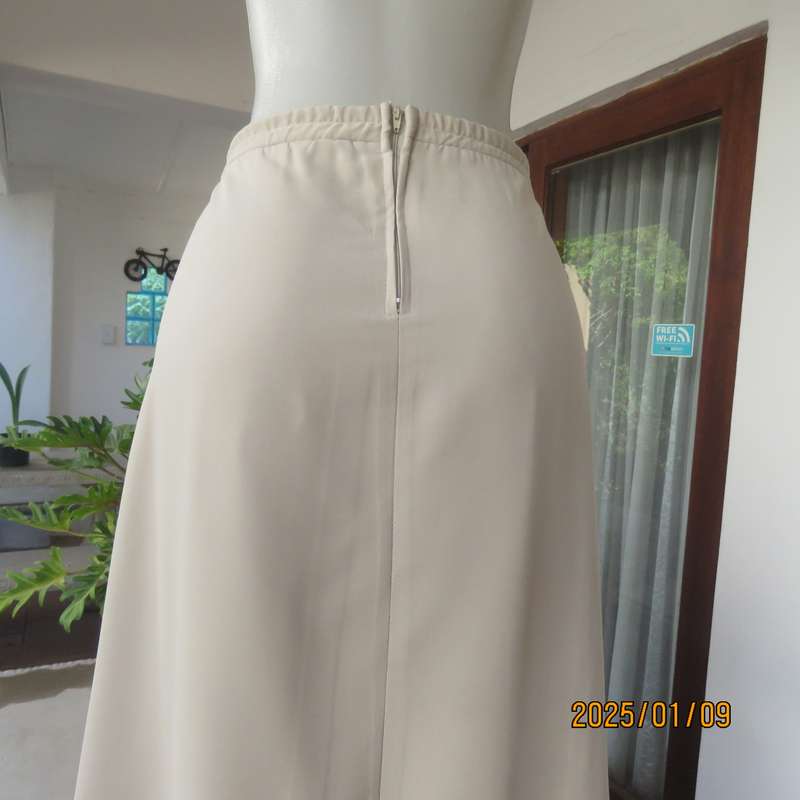 FERGIE oatmeal colour pencil skirt size 50-52. Flat front.Elasticated waist back. Front tucked seam.