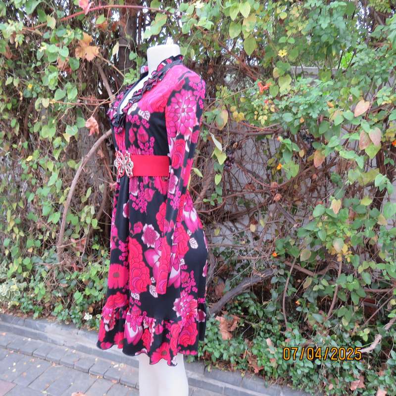 OASIS black stretch polyester with red-lilac floral print slip over long sleeve dress. Size 33