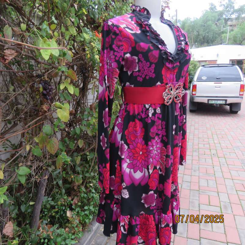 OASIS black stretch polyester with red-lilac floral print slip over long sleeve dress. Size 33