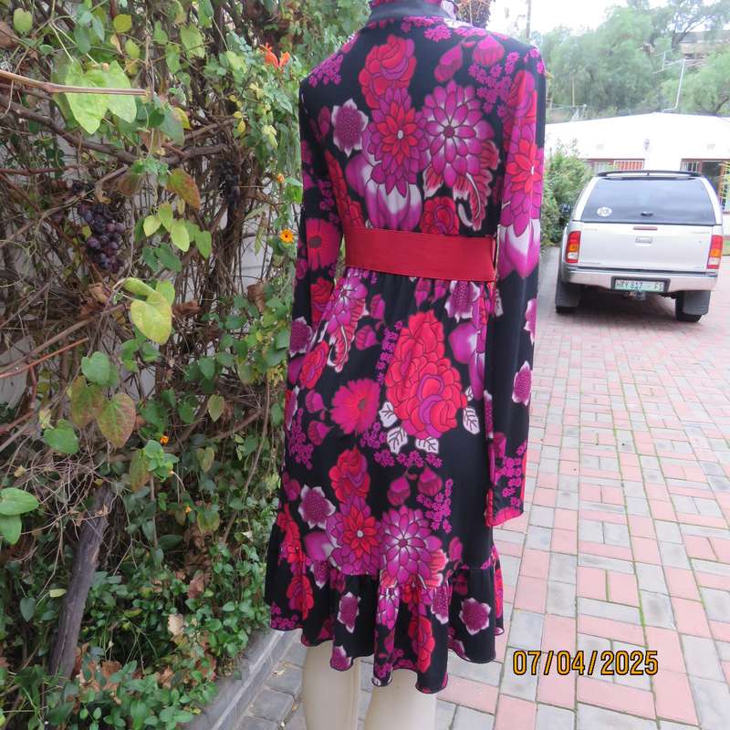OASIS black stretch polyester with red-lilac floral print slip over long sleeve dress. Size 33