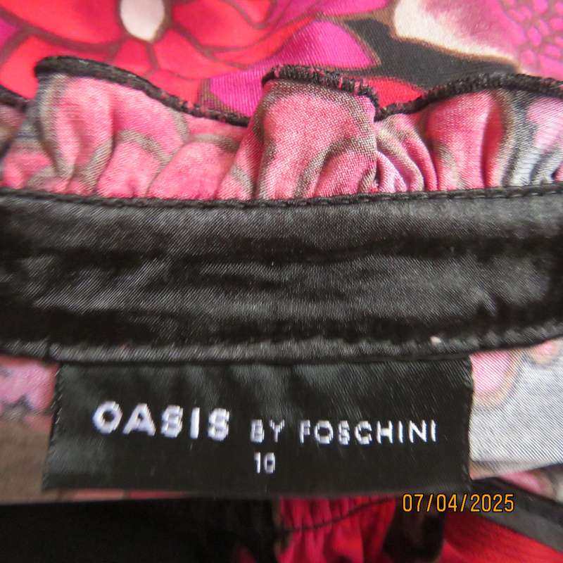 OASIS black stretch polyester with red-lilac floral print slip over long sleeve dress. Size 33