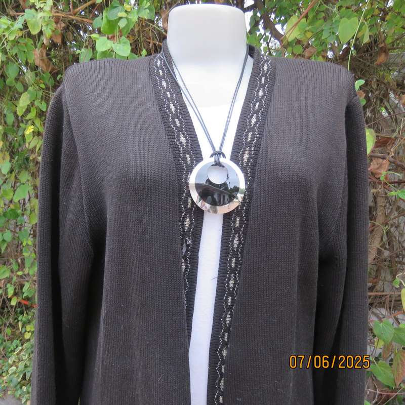 Black acrylic knit long sleeve knitted button down cardigan. Silver thread fronts-pockets. Size 44