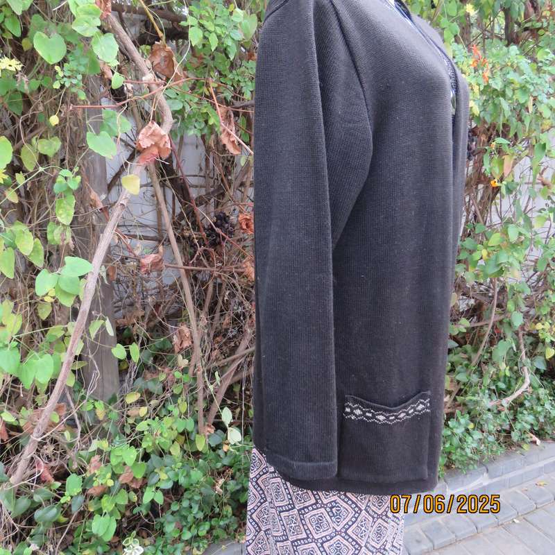 Black acrylic knit long sleeve knitted button down cardigan. Silver thread fronts-pockets. Size 44