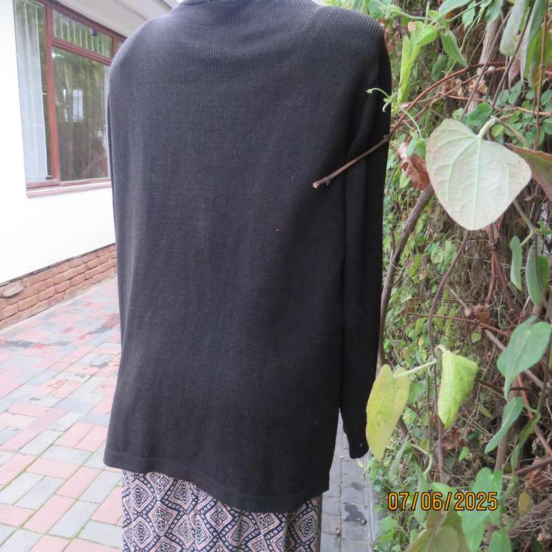 Black acrylic knit long sleeve knitted button down cardigan. Silver thread fronts-pockets. Size 44