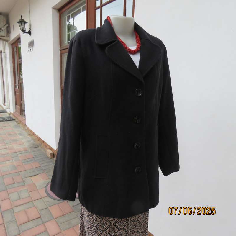 WOOLWORTHS very black woolen poly-viscose fully lined jacket. 4 button closure. Size 40
