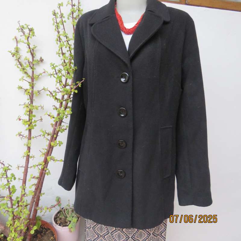 WOOLWORTHS very black woolen poly-viscose fully lined jacket. 4 button closure. Size 40