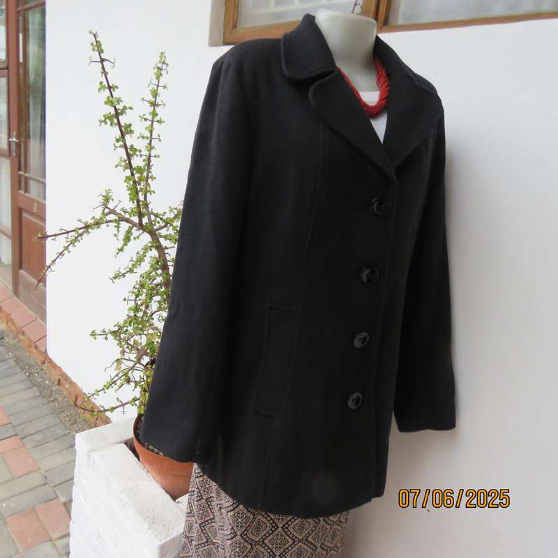 WOOLWORTHS very black woolen poly-viscose fully lined jacket. 4 button closure. Size 40