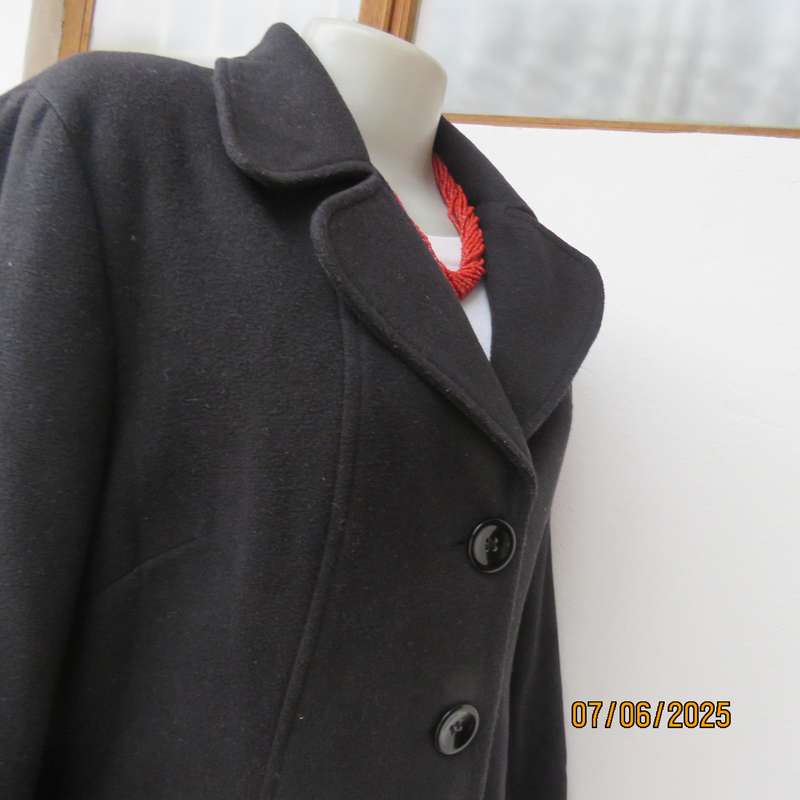 WOOLWORTHS very black woolen poly-viscose fully lined jacket. 4 button closure. Size 40