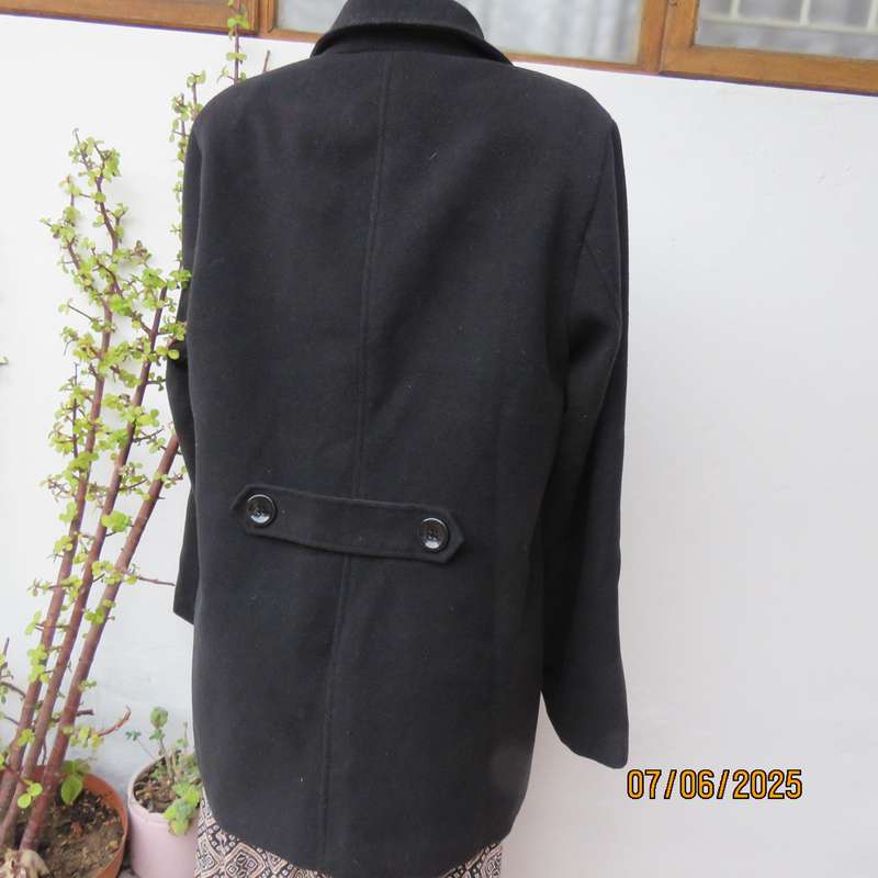 WOOLWORTHS very black woolen poly-viscose fully lined jacket. 4 button closure. Size 40