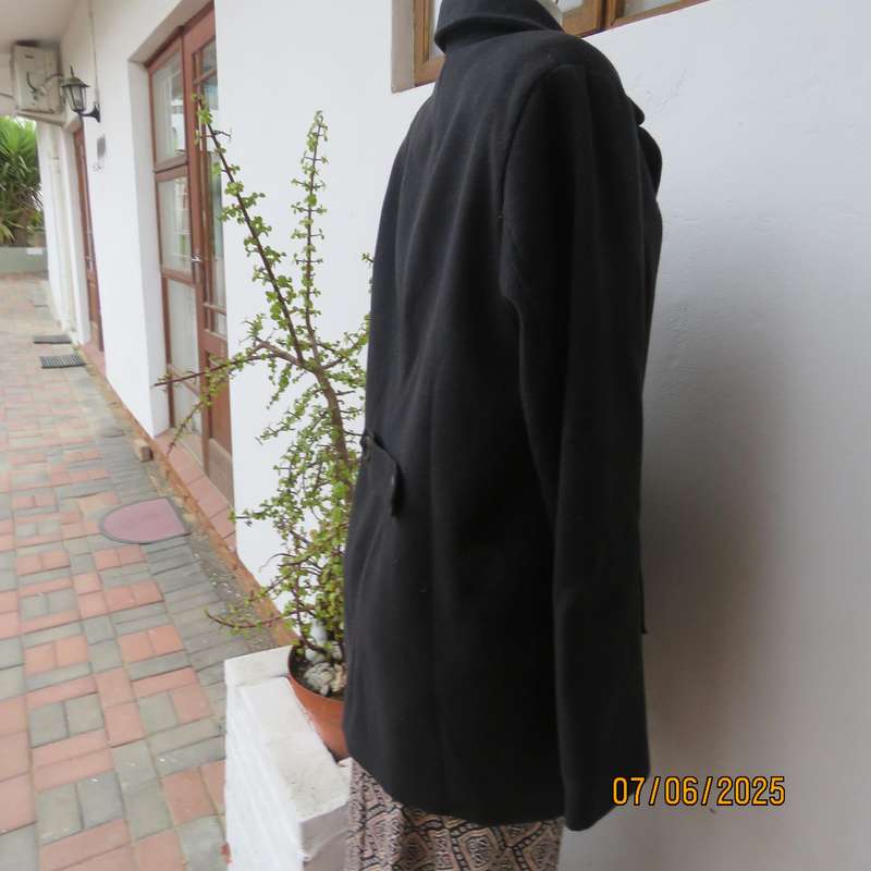 WOOLWORTHS very black woolen poly-viscose fully lined jacket. 4 button closure. Size 40