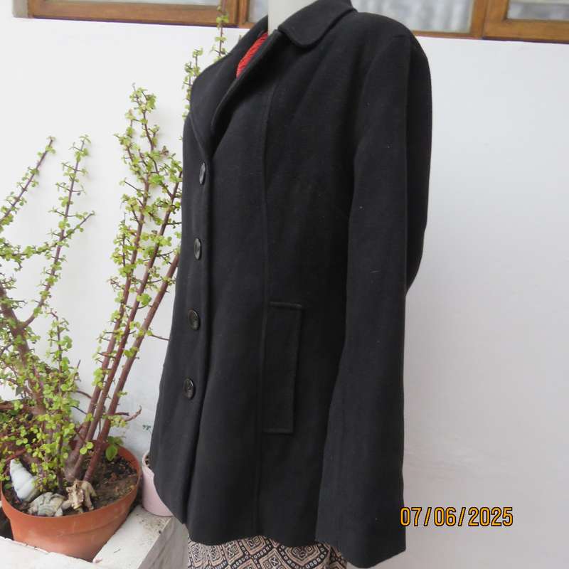 WOOLWORTHS very black woolen poly-viscose fully lined jacket. 4 button closure. Size 40