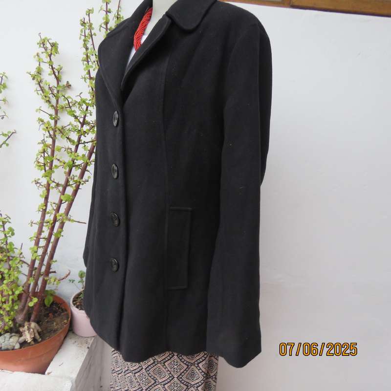WOOLWORTHS very black woolen poly-viscose fully lined jacket. 4 button closure. Size 40
