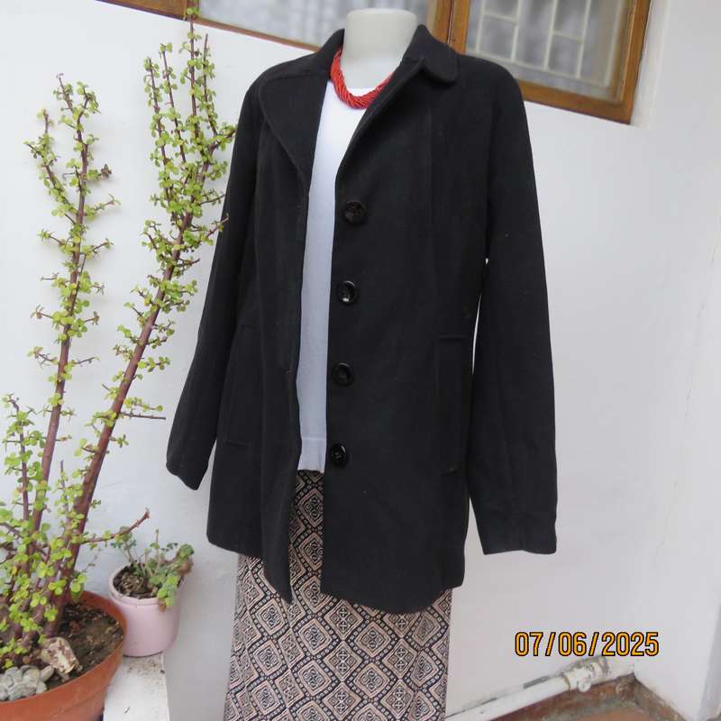 WOOLWORTHS very black woolen poly-viscose fully lined jacket. 4 button closure. Size 40