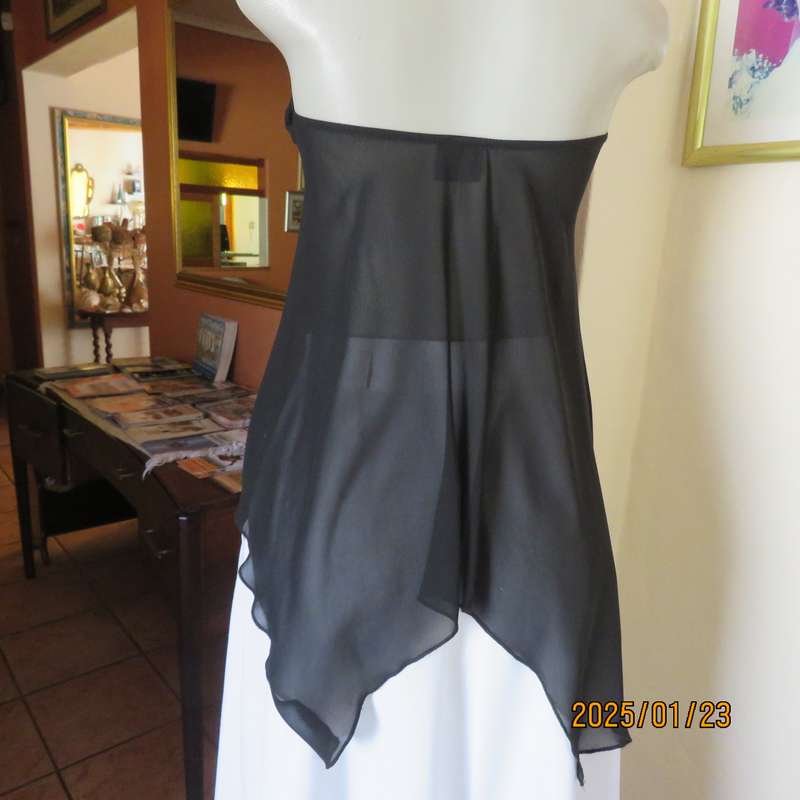 Luxury WWW black evening top size 32. Strapless. Bra area double.Rest sheer high-low polyester.