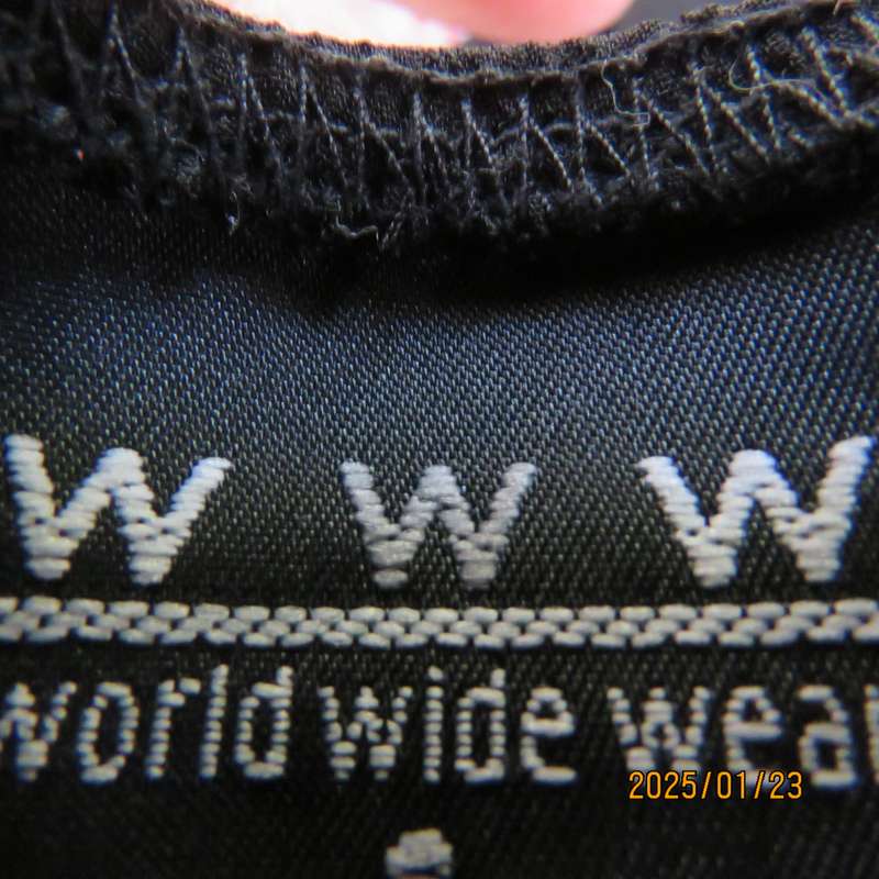 Luxury WWW black evening top size 32. Strapless. Bra area double.Rest sheer high-low polyester.
