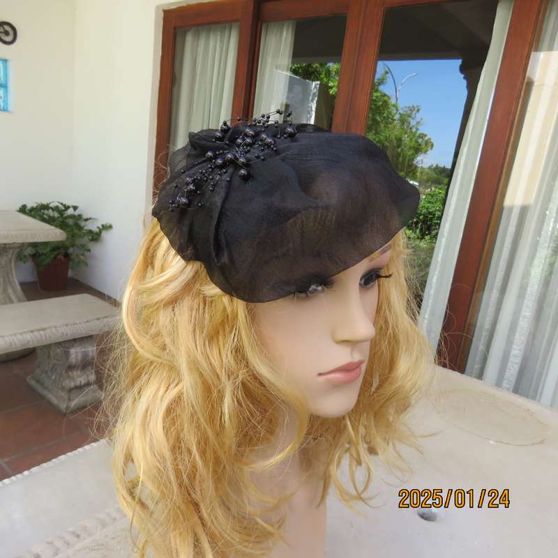 Stunning hand made black organza fascinator-hairband with bead decoration. New item.