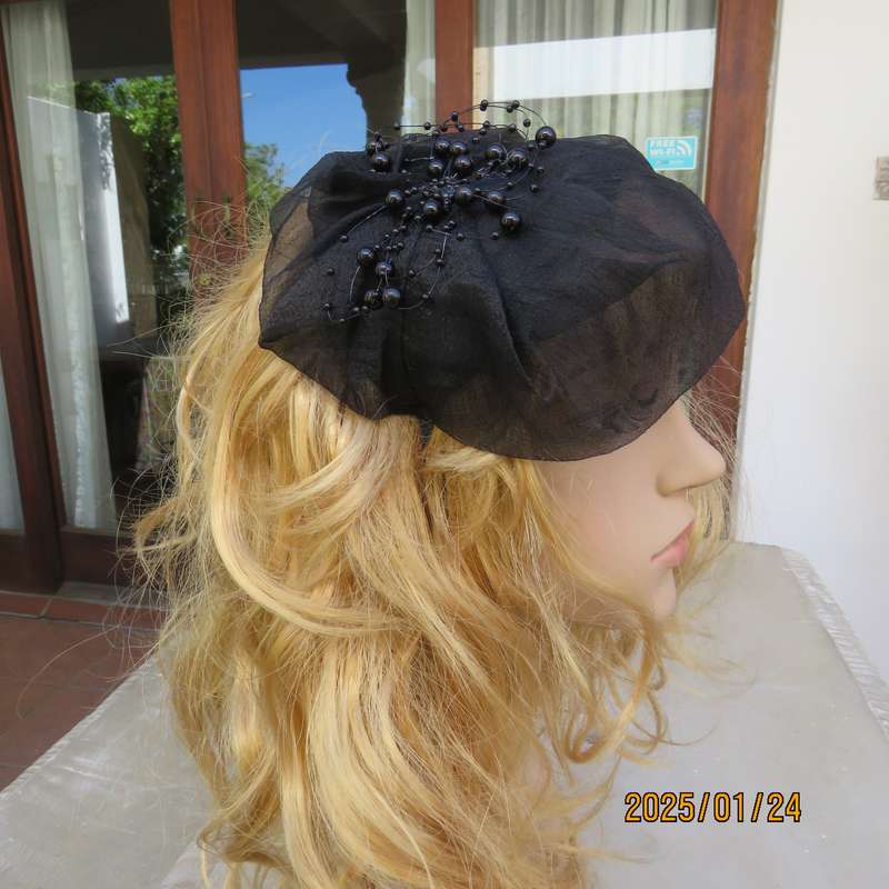 Stunning hand made black organza fascinator-hairband with bead decoration. New item.