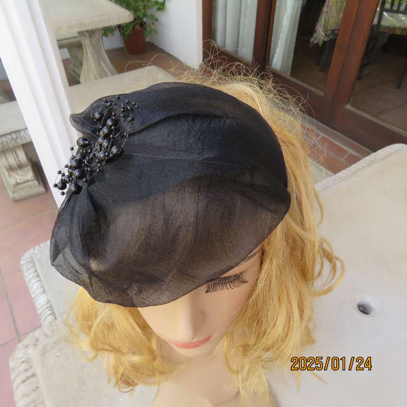 Stunning hand made black organza fascinator-hairband with bead decoration. New item.