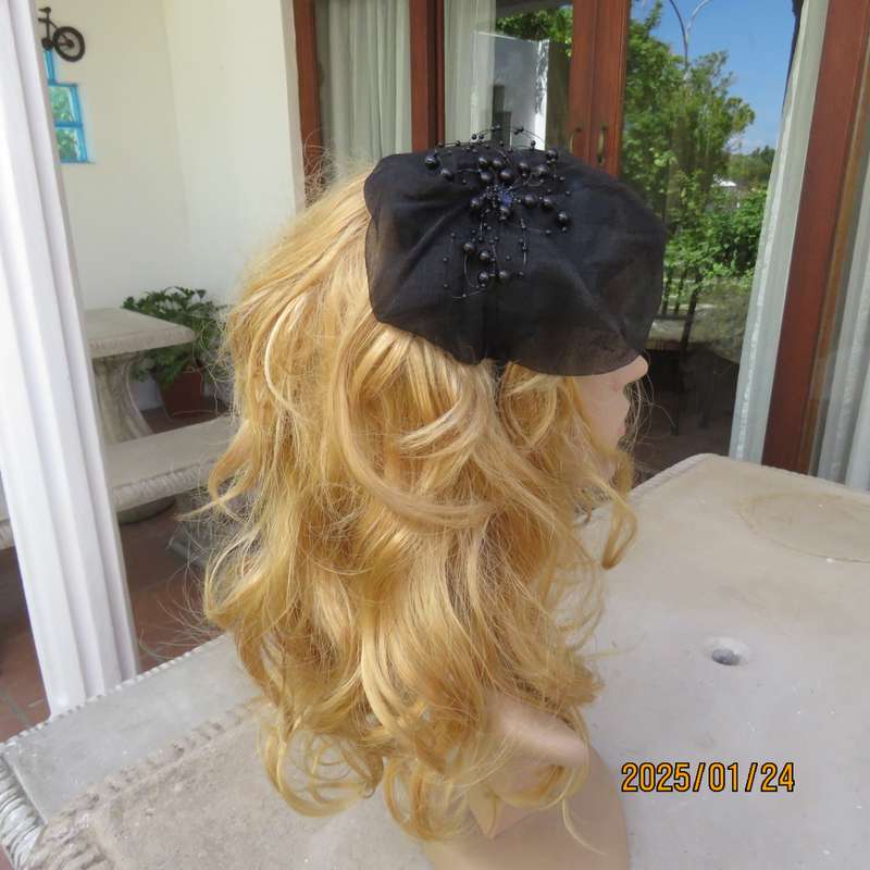 Stunning hand made black organza fascinator-hairband with bead decoration. New item.