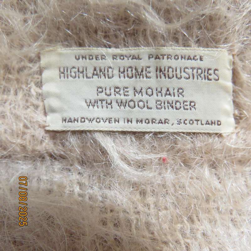 Pure mohair rich cream knitted jacket from Scotland. Size 38 to 42. Knit on elbow sleeves. Open