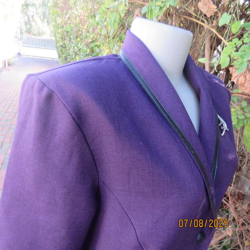 Purple tailored long sleeve jacket with shawl collar and 3 button closure. Size 36