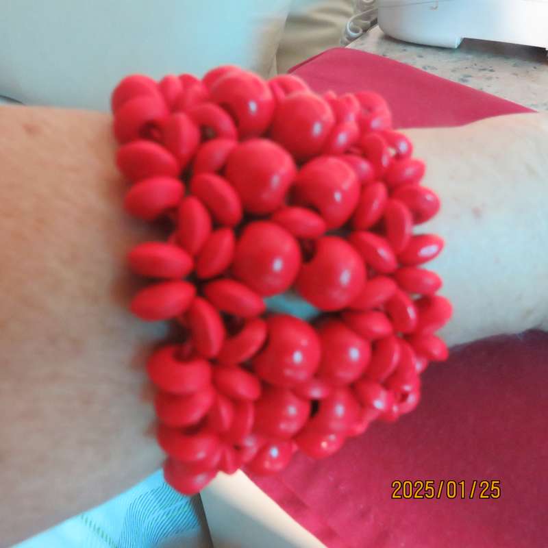 Wide bright red stretch bangle width 5cm. Different size beads. New item