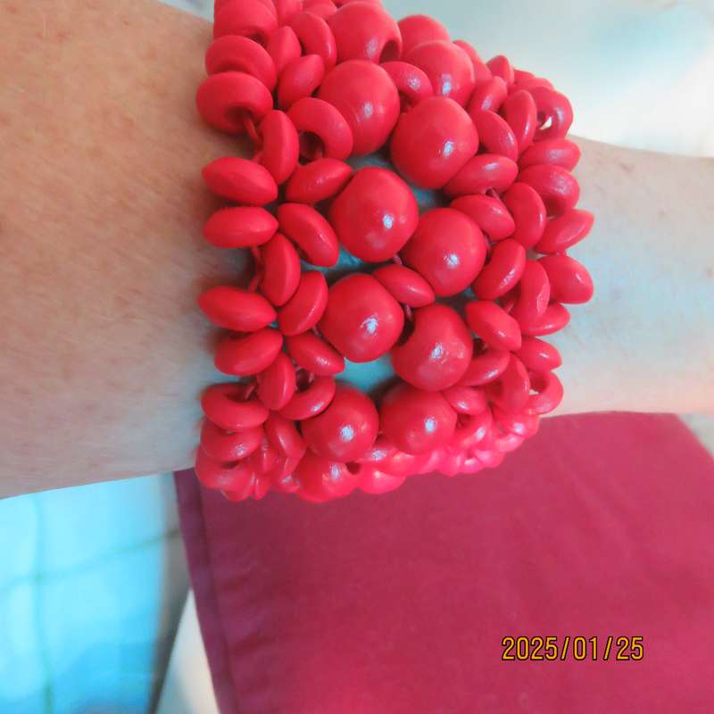 Wide bright red stretch bangle width 5cm. Different size beads. New item